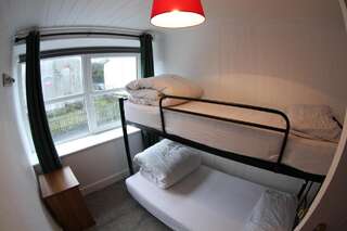 Лоджи The Boathouse Lodge Hostel Бандоран Двухместный номер с 2 отдельными кроватями-3